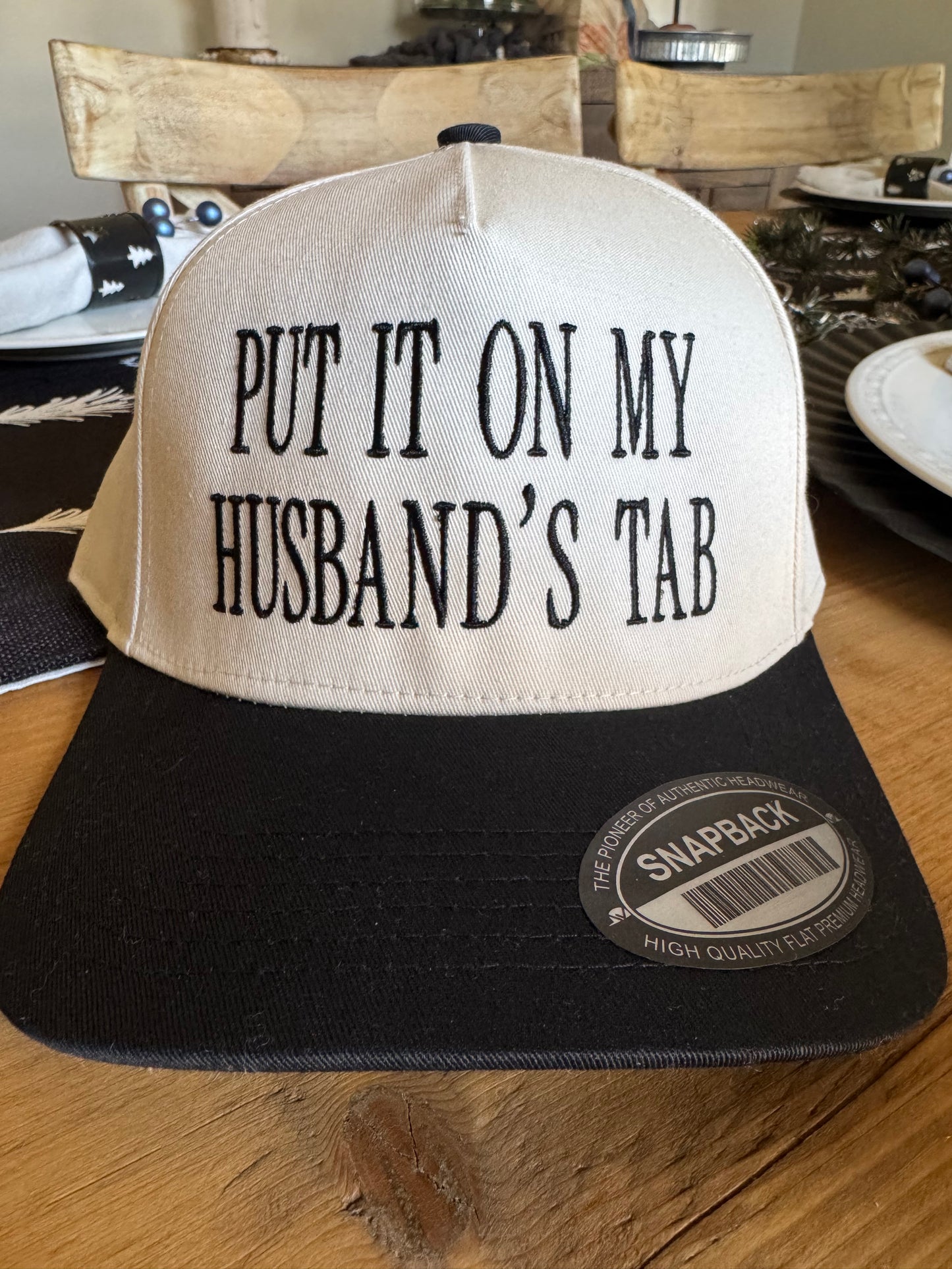 Put it on my husbands tab hat